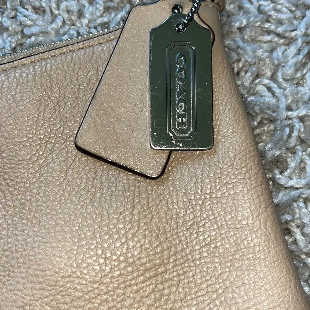 Bleecker beige leather cross body bag by COACH